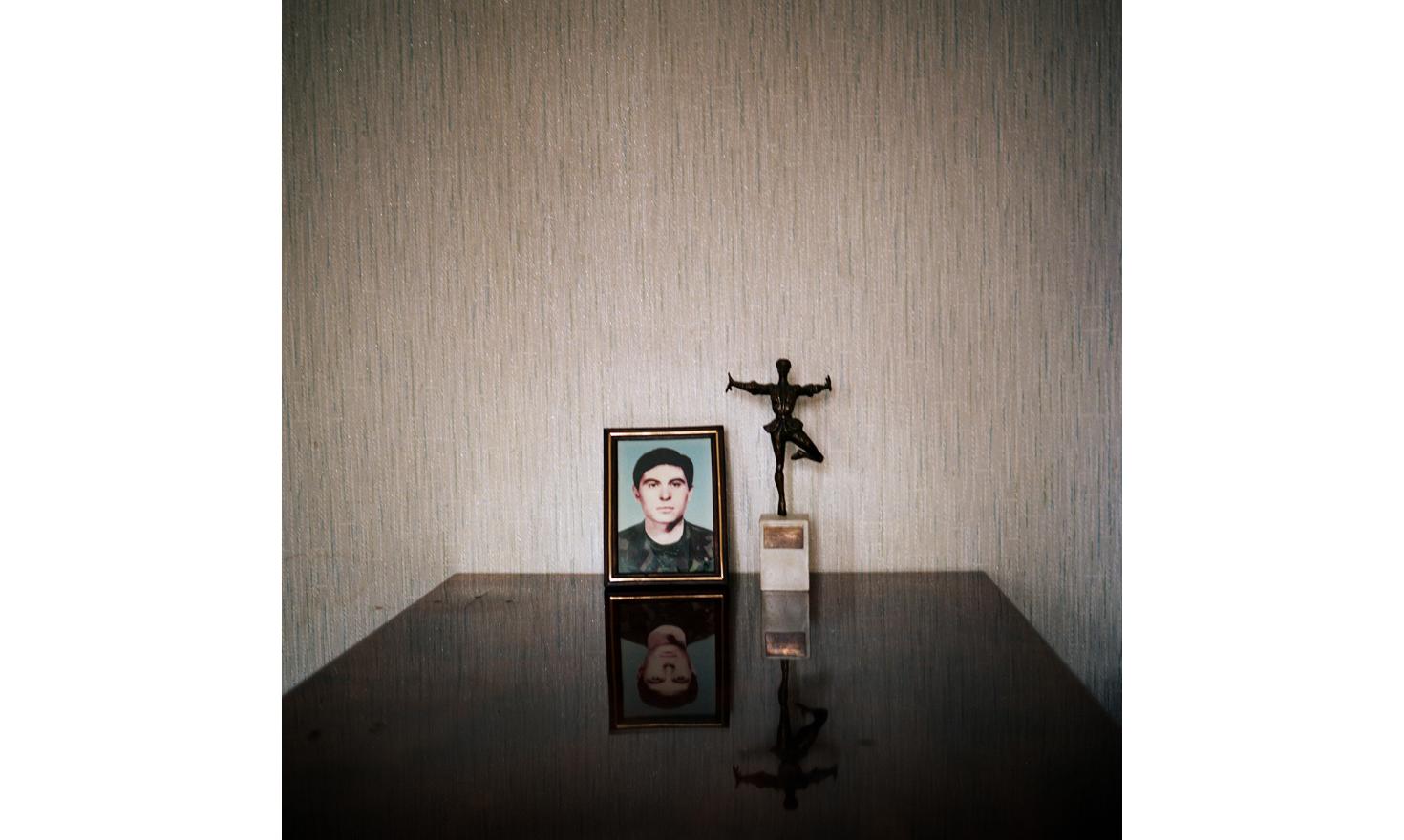 Picture of a soldier, a georgian from Abkhazia, in the appartment of his father who lives now in Rustavi, a city in Tbilissi suburb. He died during the fight against the Abkhazs during the war between Abkhazia and Georgia.