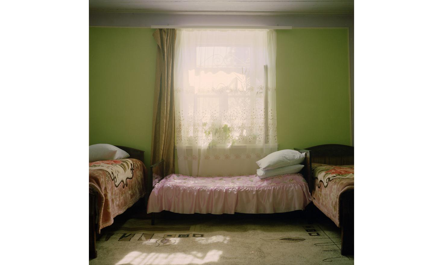 Anik's house. She lives alone while her husband and her son are both working in Russia. Her future daughter in law will live with her while her son will work in Russia.