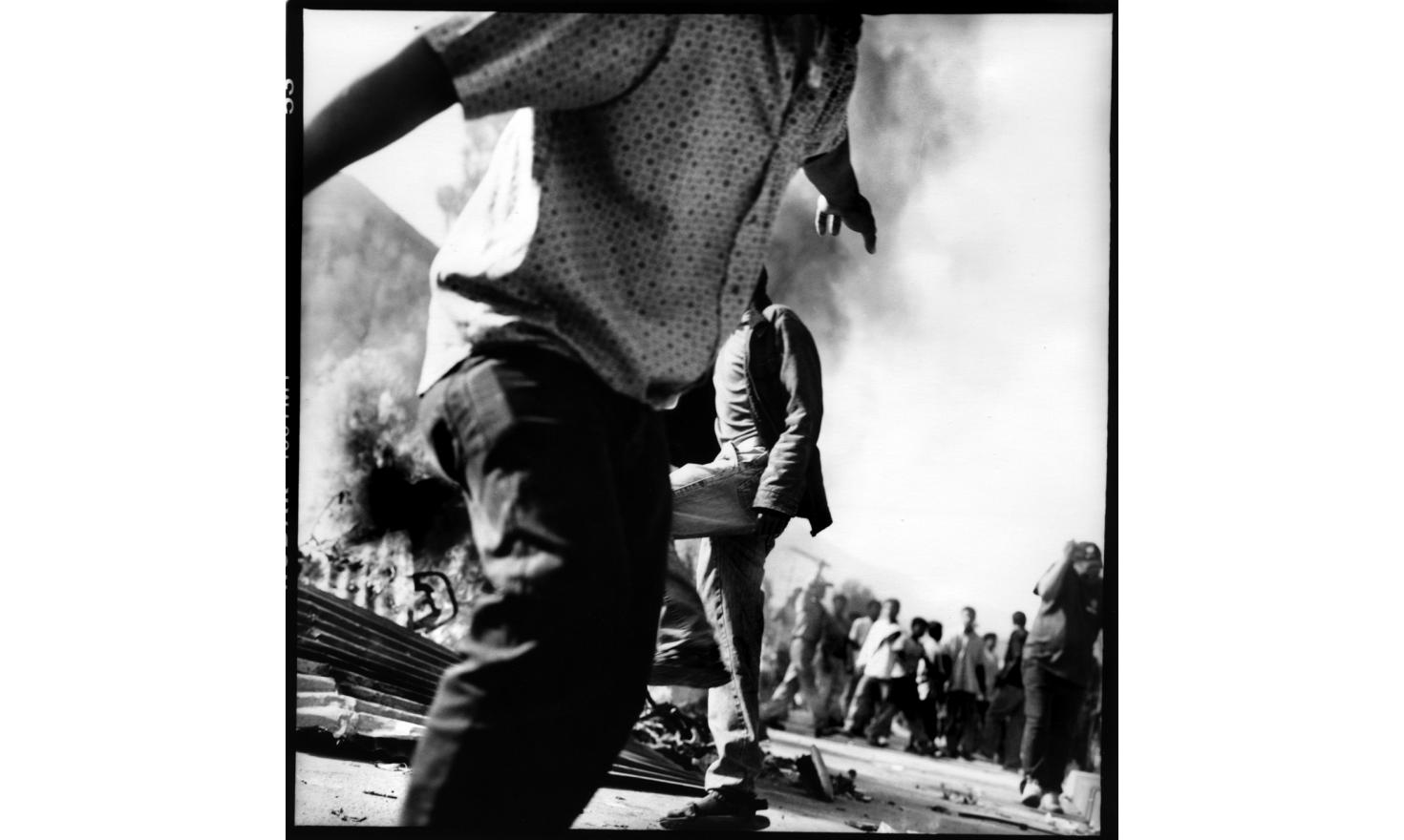 © Agnès Dherbeys / MYOP Anti Absolute monarchy protestors are burning tires, which becomes the ordinary environnement on the Ring Road during the weeks of protest. Kalanki, outskirt of Kathmandu Nepal 21st of April 2006