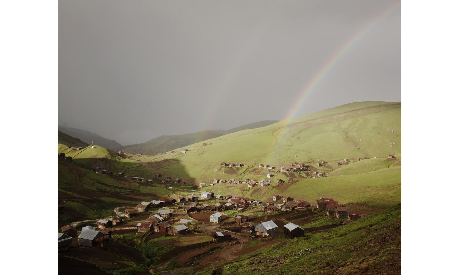 A rainbow after the storm. Zortikheli is the mountain pasture village of the inhabitants of Ghorjomi. A big part of the men and some families come here for a few monthes with their cattles. They have everything here: shop, school, etc